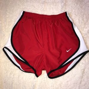 Red Nike shorts